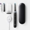 Oral-B iO Deep Clean + Whiten Rechargeable Electric Toothbrush with Visible Pressure Sensor, 2 Minute Timer, 5 Cleaning Settings, 1 iO5 Limited, 3 Toothbrush Heads, Travel Case & Refill Holder, Black