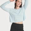 Real Essentials 4 Pack: Women's Dry-Fit Long Sleeve Petal Back Crop Top - Athletic Cropped Tee (Available in Plus Size)