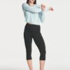 Real Essentials 4 Pack: Women's Dry-Fit Long Sleeve Petal Back Crop Top - Athletic Cropped Tee (Available in Plus Size)