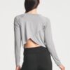 Real Essentials 4 Pack: Women's Dry-Fit Long Sleeve Petal Back Crop Top - Athletic Cropped Tee (Available in Plus Size)