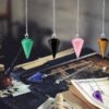 DUQGUHO 6 Pcs Crystal Pendulum Set Wiccan Accessories Divination Tools Natural Healing Crystal Quartz Colored Gemstone Pendants for Spritual Pointed Crystal Grid Reiki Meditation